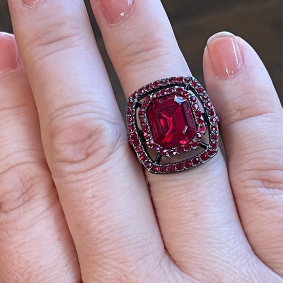 Givenchy Red Crystal
Ring in gunmetal setting. Size 6.75 - Picture 5 of 11